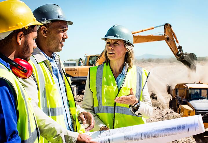 Construction Workers Having Conversation