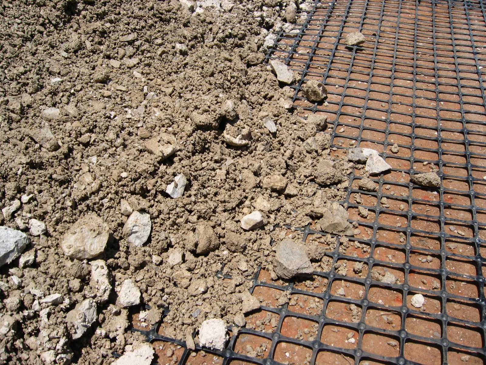 Tensar's Biaxial (BX) Geogrid with aggregate on top.